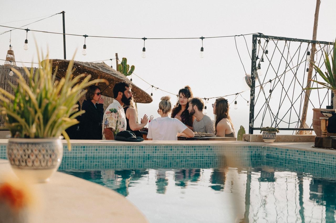Rooftop terrace with Atlantic village view — Morocco women's retreat villa