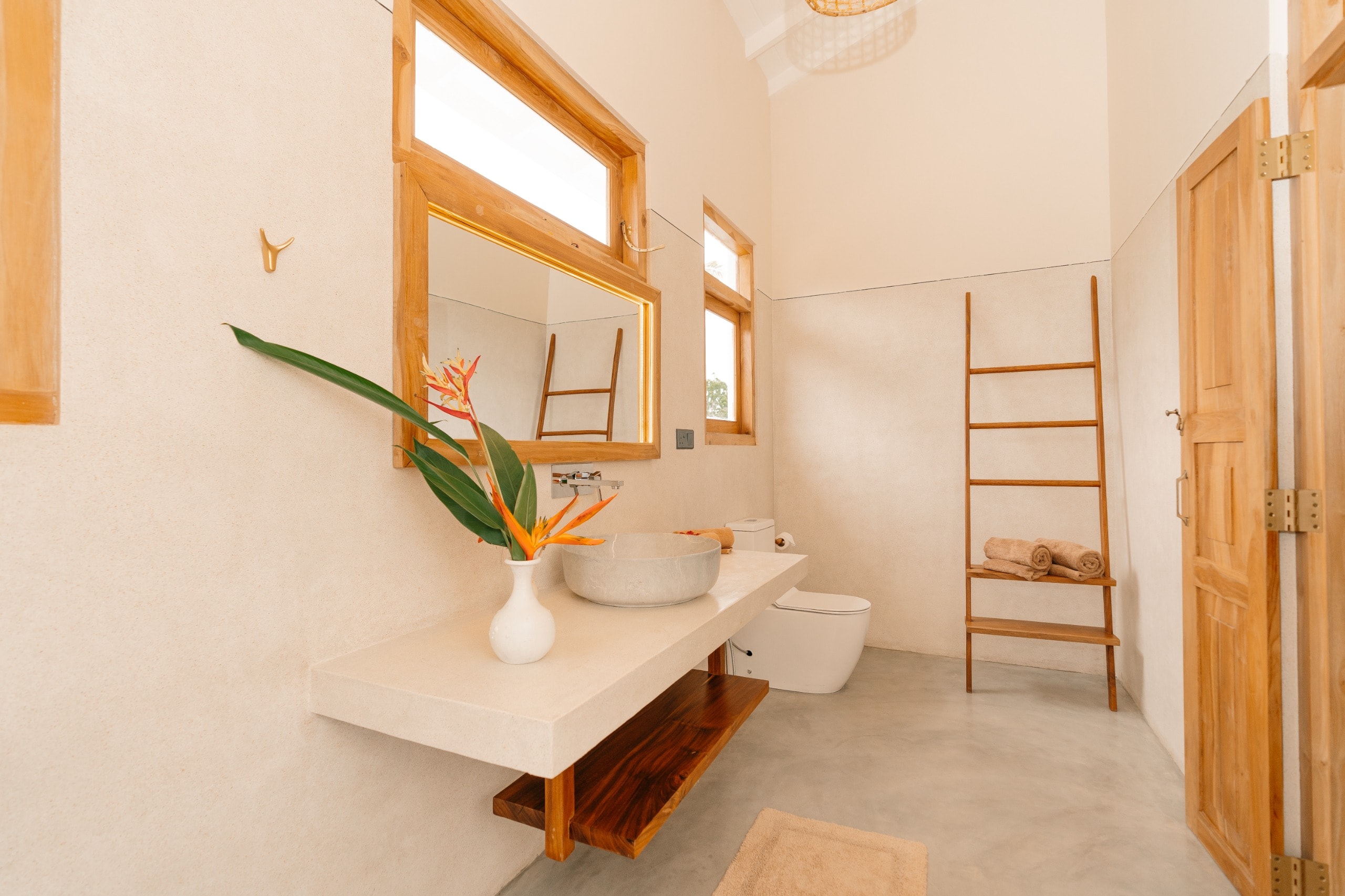 Villa Oura Spirit bathroom with wooden accents and natural light